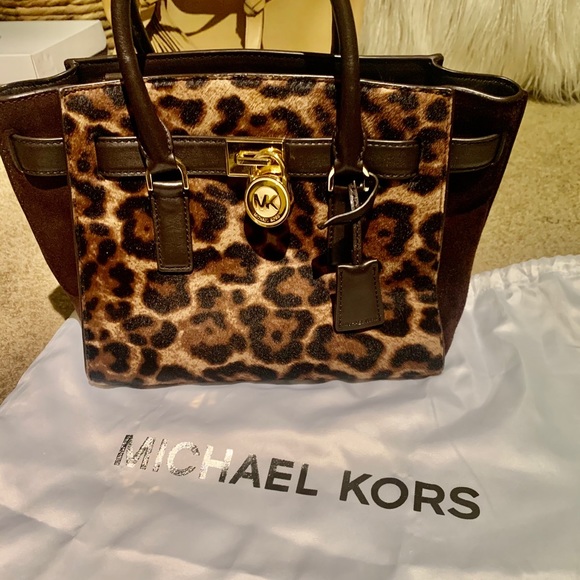 mk cheetah purse